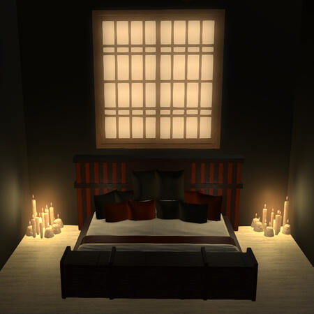 Dark candlelit bed